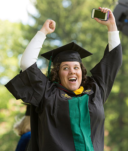 Photo: Student celebrating graduation.